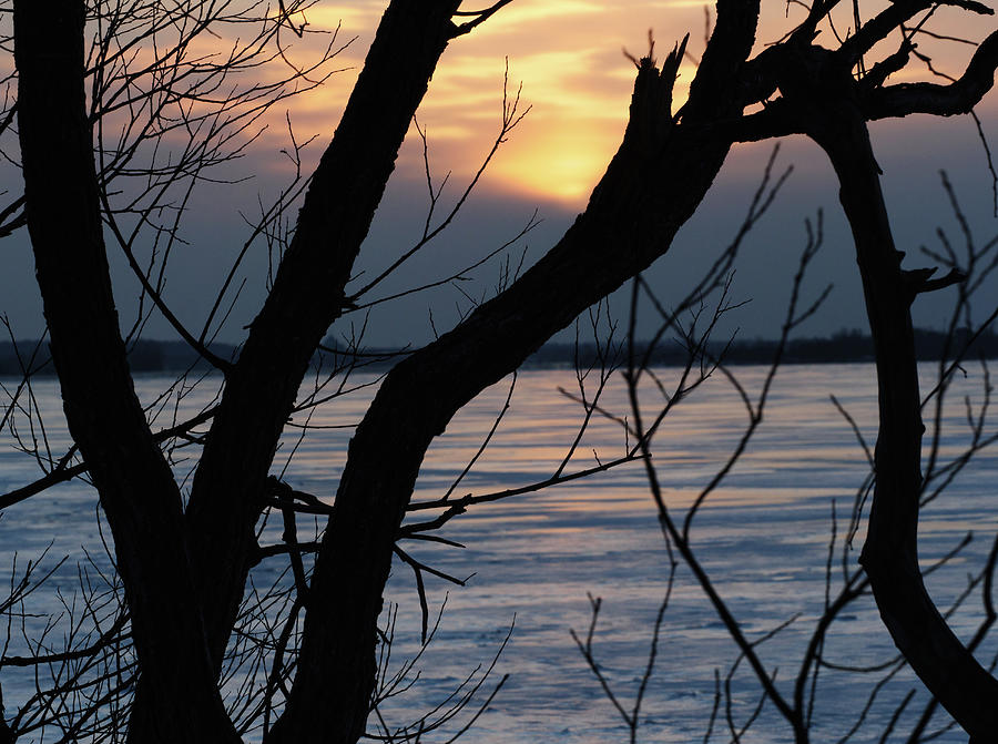 Sunset on the frozen Ottawa River. #3 Photograph by Rob Huntley