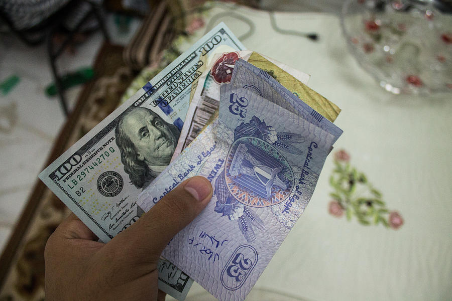 The Egyptian pound dropped again against the dollar Photograph by NurPhoto The Egyptian pound dropped again against the dollar Photograph by NurPhoto