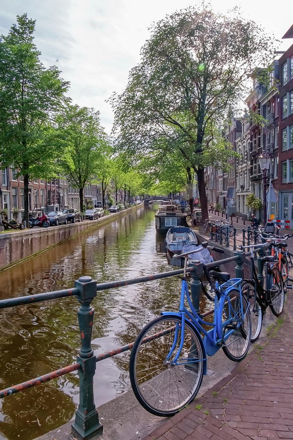 Typical Buildings, Canal And Bikes In Amsterdam, Netherlands Photograph