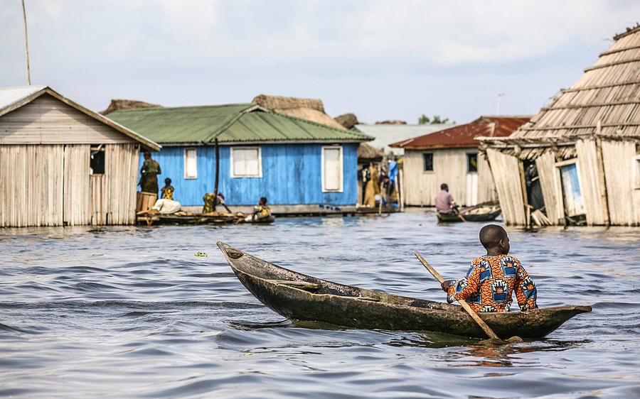 Village on the water. Ganvie, Benin. #3 Photograph by Peeterv