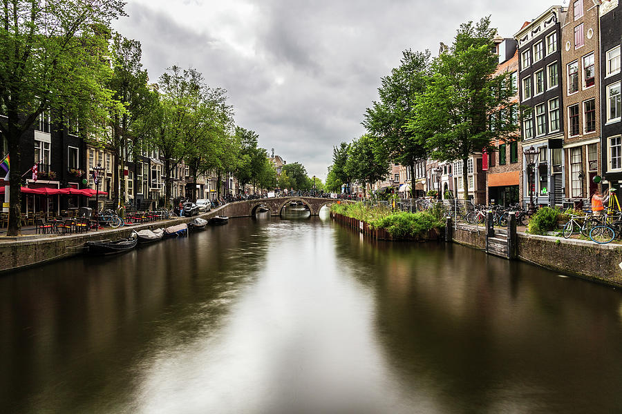 Water canal in Amsterdam Photograph by Fabiano Di Paolo