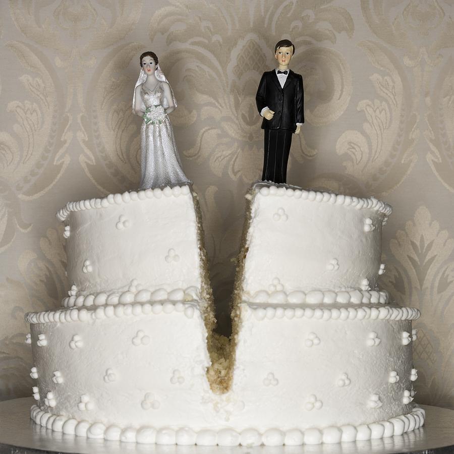 Wedding cake visual metaphor with figurine cake toppers #3 Photograph by Rubberball/Mike Kemp
