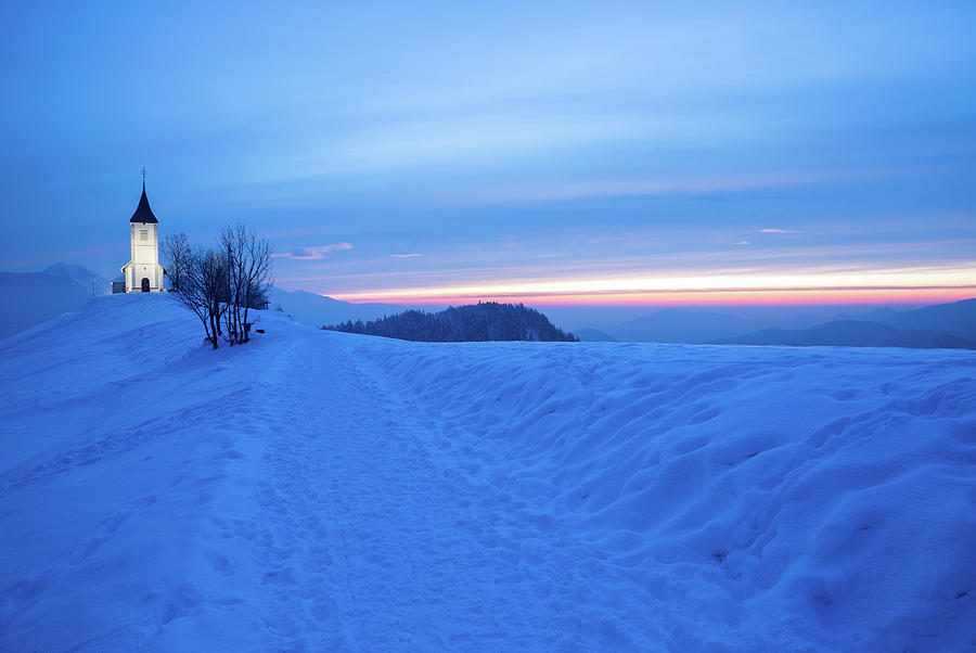 Winter sunrise at Jamnik church of Saints Primus and Felician #3 Photograph by Ian Middleton