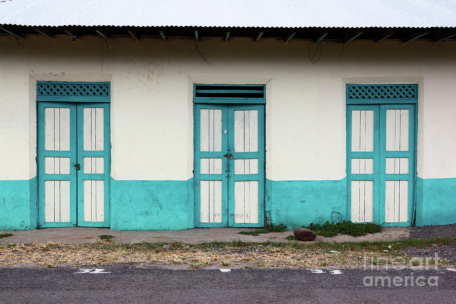 3 wooden doors in Guarare Panama Photograph by James Brunker