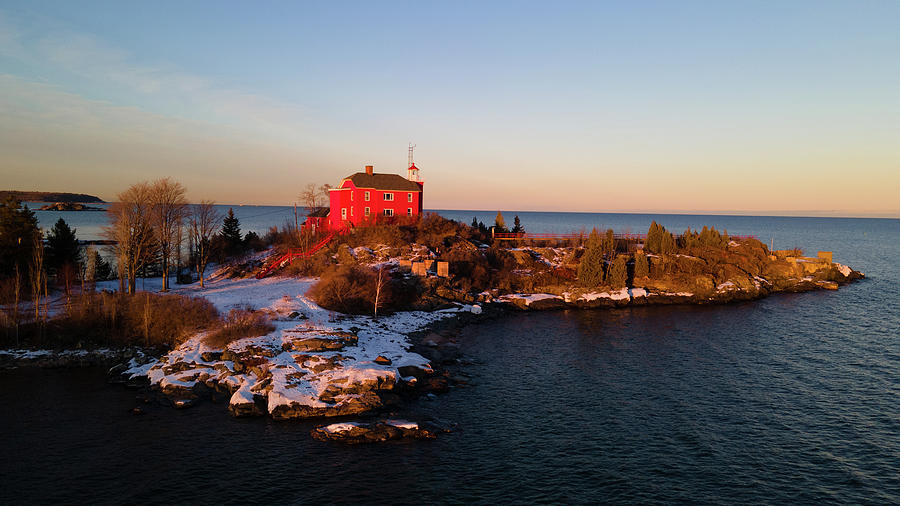 Marquette Harbor Lighthouse along Lake Superior in Marquette Michigan in the winter #31 Photograph by Eldon McGraw