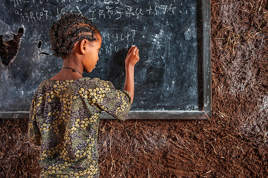 African little girl is learning Amharic language #4 Photograph by Hadynyah