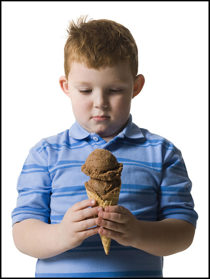 Boy Holding An Ice Cream Cone #4 Photograph by RubberBall Productions