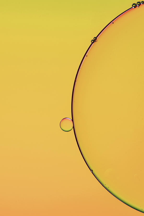 Bright abstract, yellow background with flying bubbles Photograph by Michalakis Ppalis
