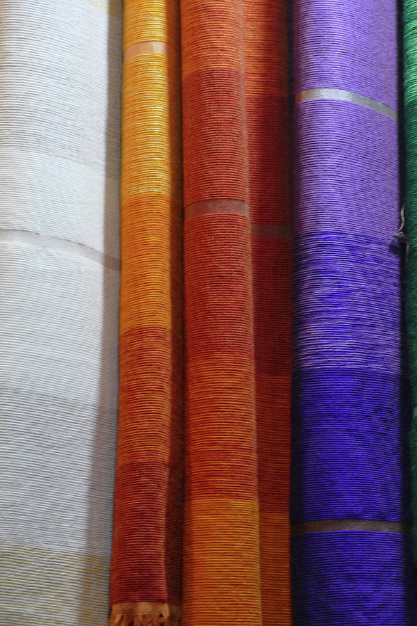 Colorful fabrics in the medina market  Photograph by Steve Estvanik