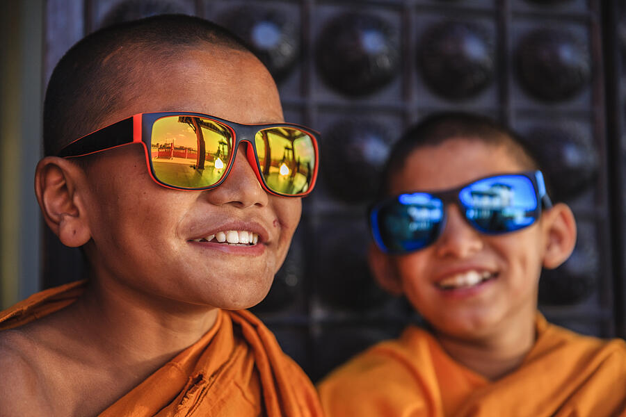 Happy Novice Buddhist monks wearing sunglasses, Bhaktapur #4 Photograph by Hadynyah