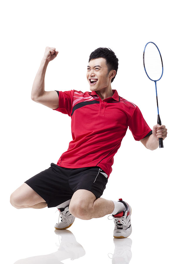 Male badminton player celebrating with excitement #4 Photograph by Lane Oatey/Blue Jean Images
