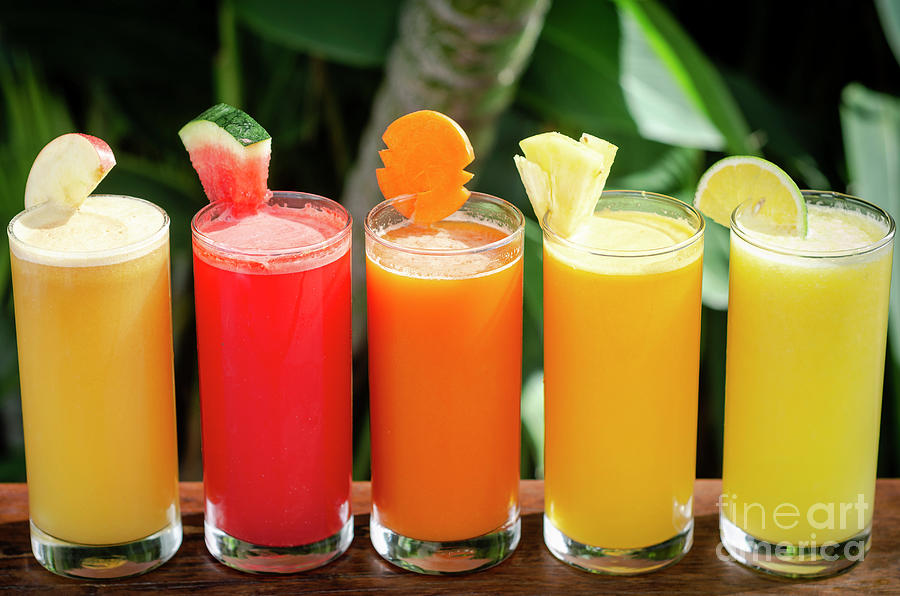 Mixed Fresh Organic Fruit Juices Glasses On Sunny Garden Table #4 Photograph by JM Travel Photography