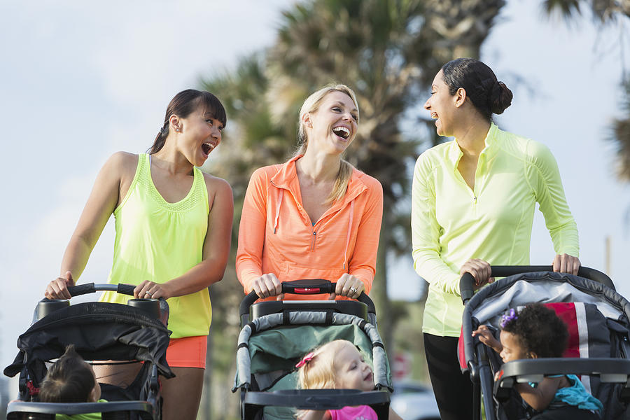 Multi-racial mothers with babies in jogging strollers #4 Photograph by Kali9