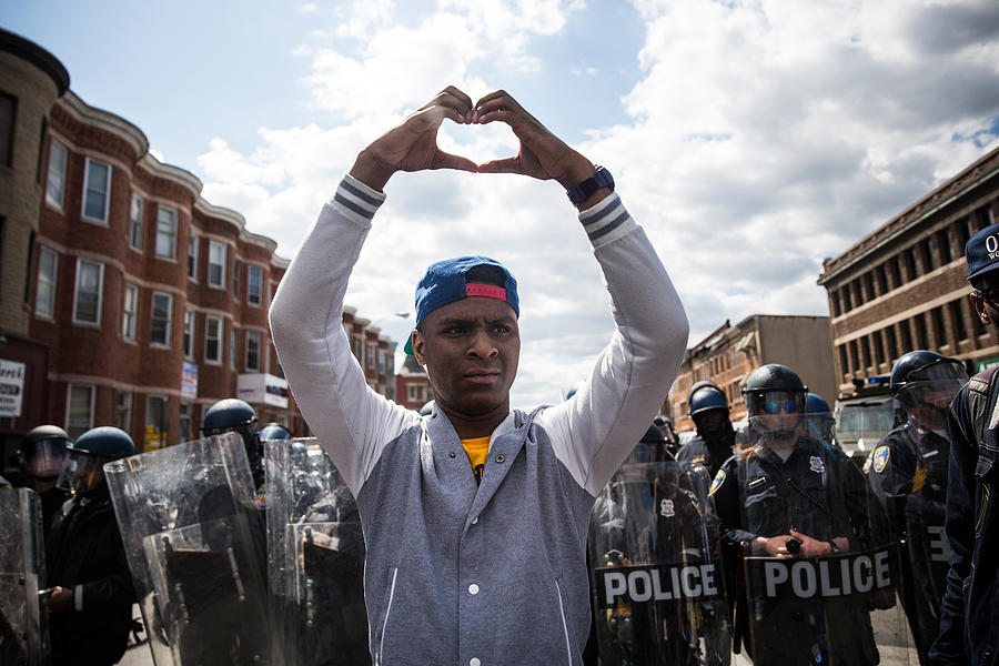 National Guard Activated To Calm Tensions In Baltimore In Wake Of Riots After Death Of Freddie Gray Photograph by Andrew Burton National Guard Activated To Calm Tensions In Baltimore In Wake Of Riots After Death Of Freddie Gray Photograph by Andrew Burton