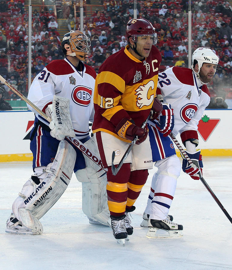 NHL Heritage Classic - Montreal Canadiens v Calgary Flames #4 Photograph by Andre Ringuette