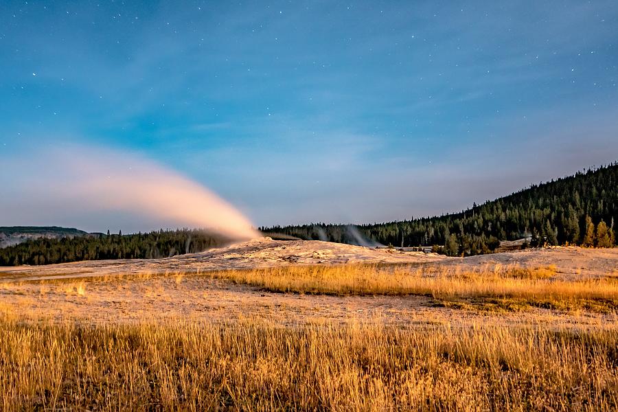 Night Photo Os Old Faithful Geisers In Yellowstone National Park #4 Photograph by Alex Grichenko