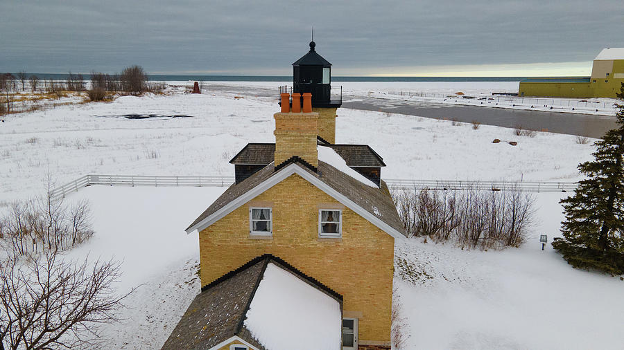 Ontonagon Michigan Lighthouse along Lake Superior in winter #4 Photograph by Eldon McGraw
