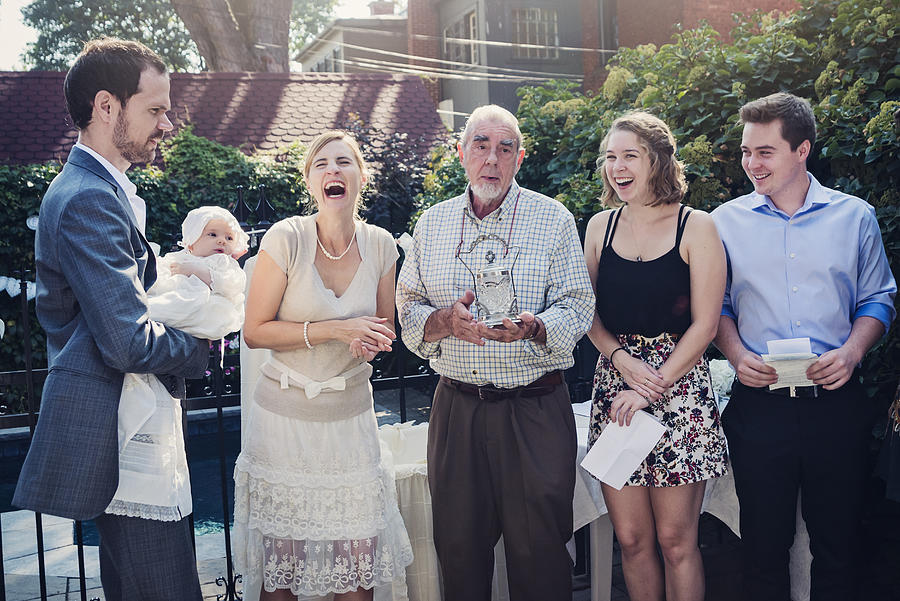 Outdoors baby baptism with family and celebrant. #4 Photograph by Martinedoucet