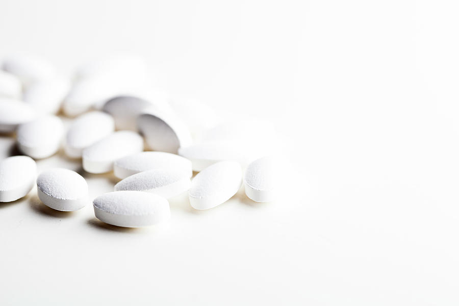 white pills background