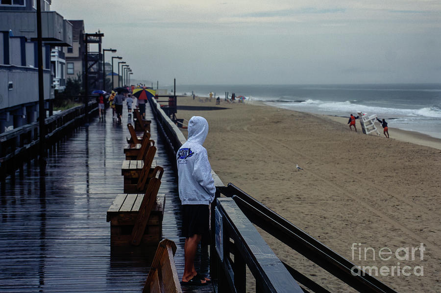 Rainy Day on the Boardwalk at Bethany Beach in Delaware #4 Photograph by William Kuta
