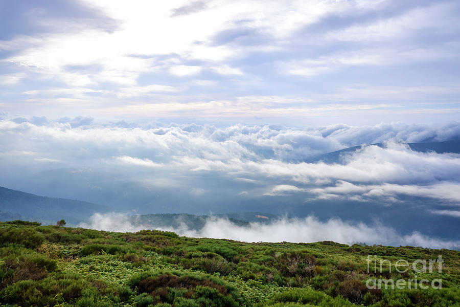Scene of a winter cloudy sky from the top of a mountain peak. #4 Photograph by Joaquin Corbalan