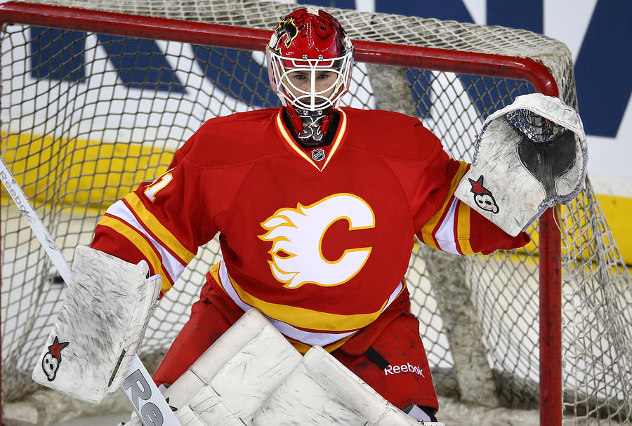 Vancouver Canucks v Calgary Flames #4 Photograph by Tom Szczerbowski