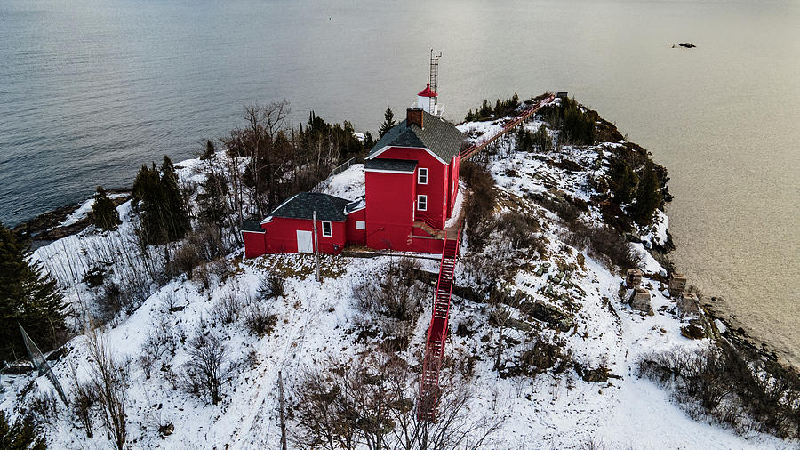 Marquette Harbor Lighthouse along Lake Superior in Marquette Michigan in the winter #40 Photograph by Eldon McGraw