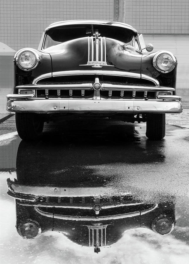 49 Pontiac after a rain Photograph by Jim Hughes