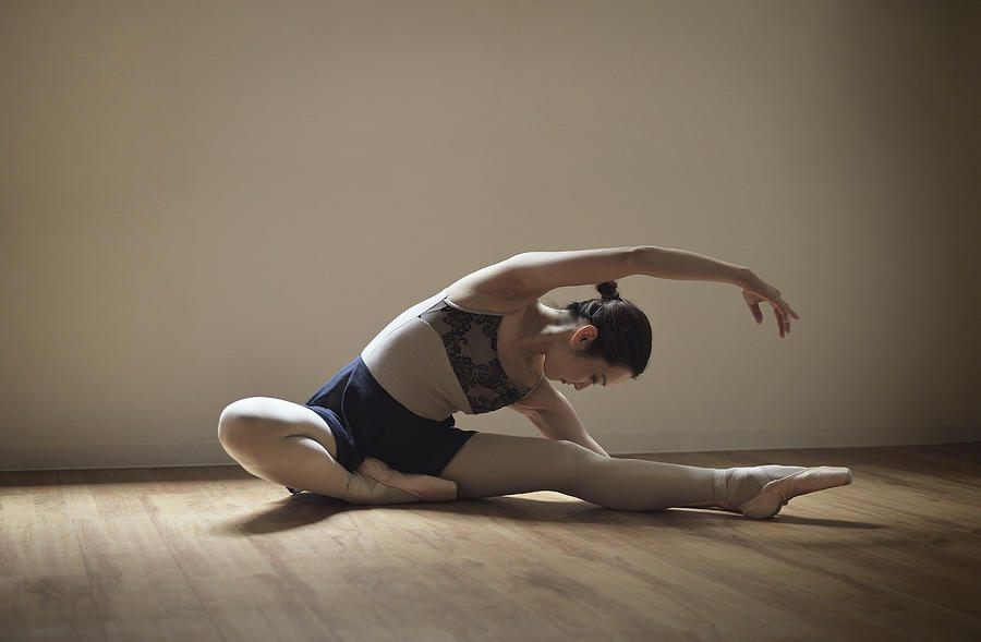 Ballerina exercising in studio #5 Photograph by Yagi Studio
