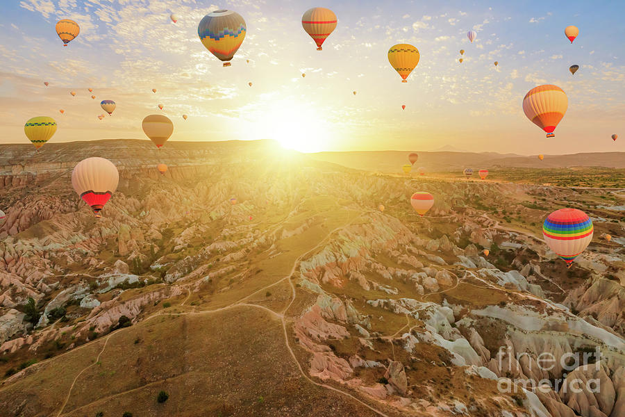 Cappadocia air balloons flying at dawn in Turkey #5 Digital Art by Benny Marty