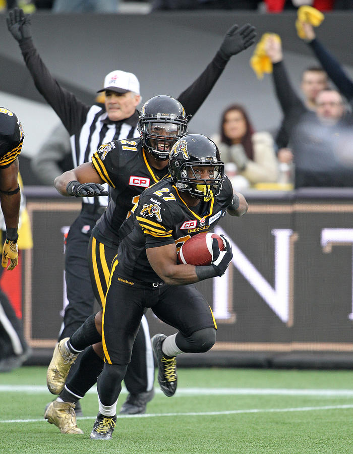 Division Finals - Montreal Alouettes v Hamilton Tiger-Cats #5 Photograph by Claus Andersen