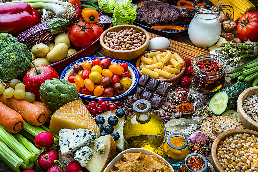 Food backgrounds: table filled with large variety of food #5 Photograph by Fcafotodigital