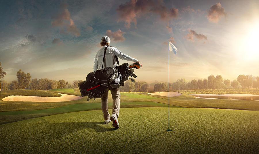 Golf: Man playing golf in a golf course #5 Photograph by Dmytro Aksonov