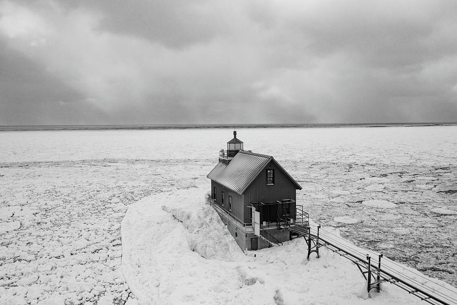 Grand Haven Michigan lighthouse in the winter in black and white #5 Photograph by Eldon McGraw