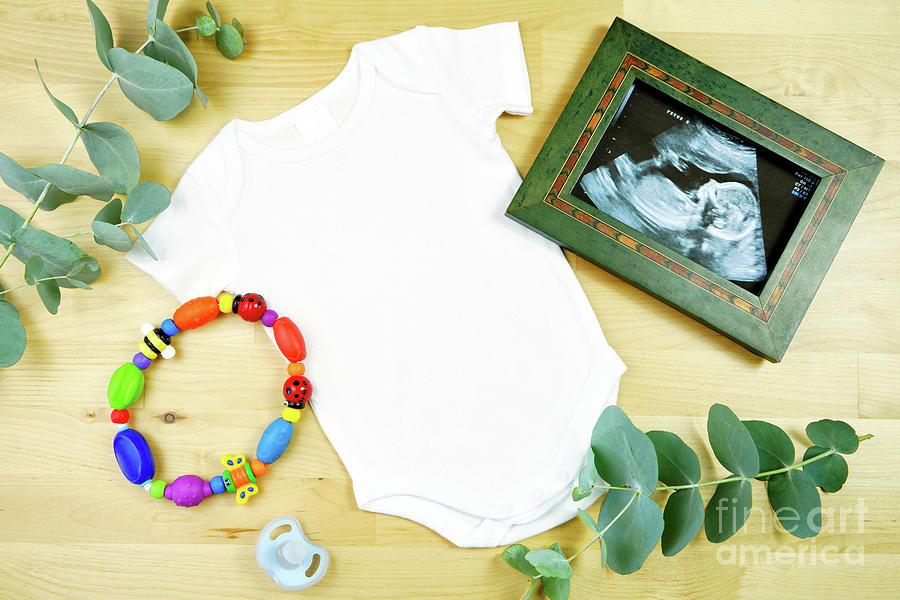 Light natural theme baby apparel top view flat lay. Mock up #5 Photograph by Milleflore Images