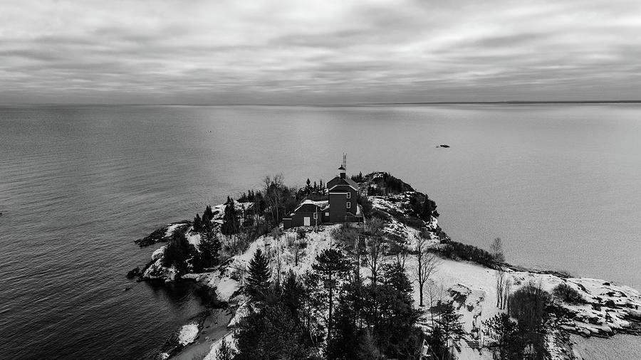 Marquette Harbor Lighthouse along Lake Superior in Marquette Michigan in the winter #5 Photograph by Eldon McGraw
