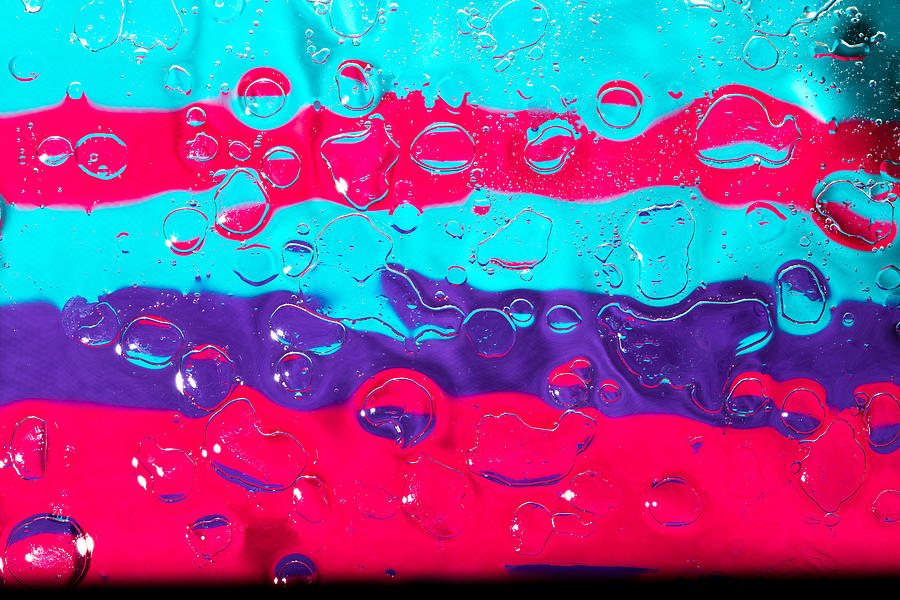 Oil and water droplets #5 Photograph by Chattranusorn09