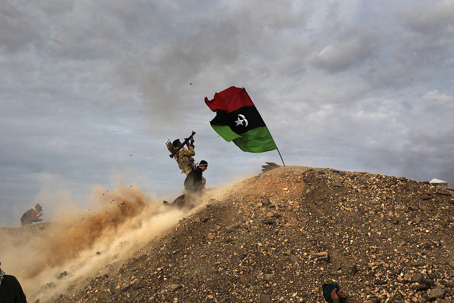Opposition Rebels Battle Gaddafi Forces In Eastern Libya Photograph by John Moore Opposition Rebels Battle Gaddafi Forces In Eastern Libya Photograph by John Moore