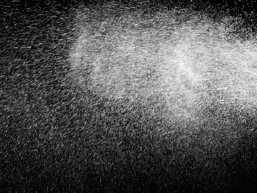 Pattern of pressured water droplets floating in the air on a black background #5 Photograph by Jose A. Bernat Bacete