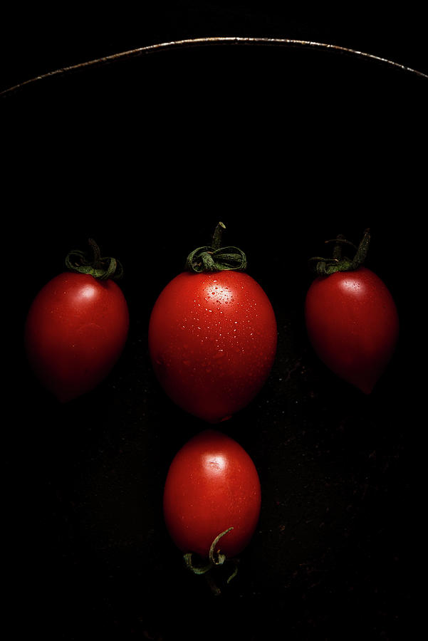 Red fresh healthy tomatoes isolated on a black pan #5 Photograph by Michalakis Ppalis
