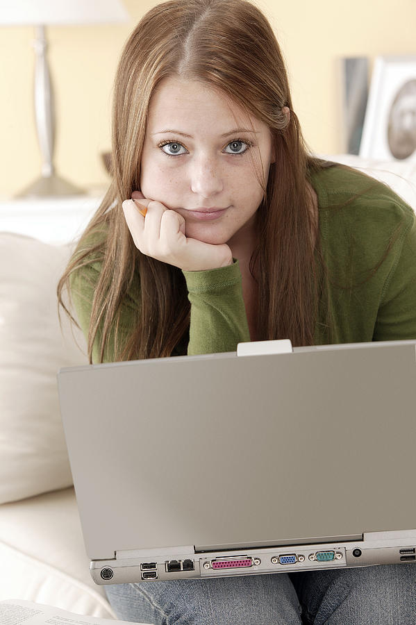 Teenager with laptop #5 Photograph by Comstock Images