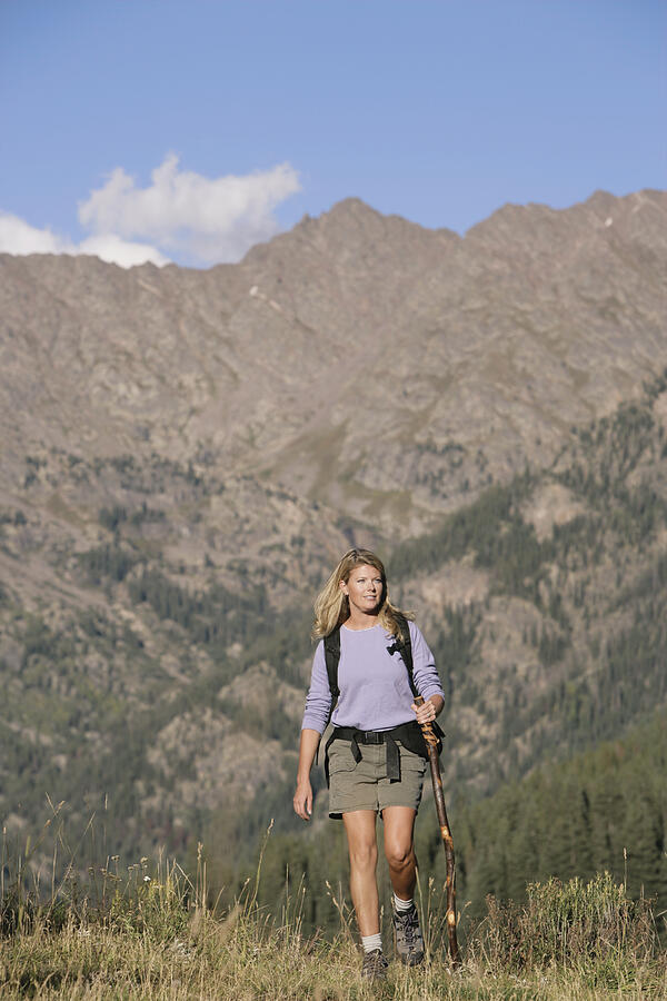 Woman hiking #5 Photograph by Comstock Images