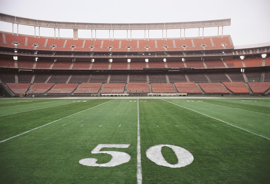50 yard line on American football field, close-up Photograph by David Madison