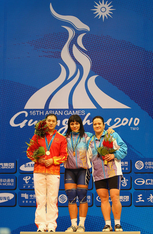 16th Asian Games - Day 6: Weightlifting #6 Photograph by Feng Li