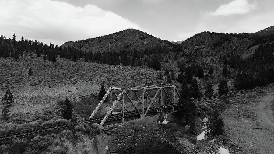 Antique steel truss bridge in Colorado in black and white #6 Photograph by Eldon McGraw