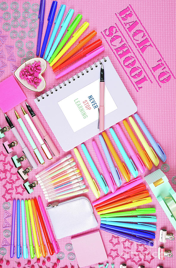 Back to school or workspace colorful stationery overhead on pink background. #6 Photograph by Milleflore Images