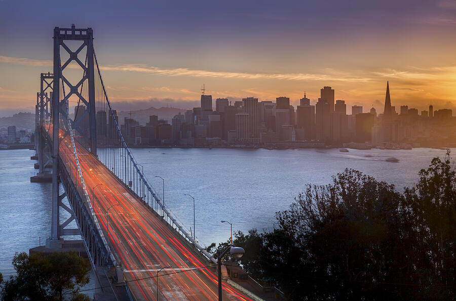 Bay Bridge and San Francisco skyline at sunset #6 Photograph by Spondylolithesis