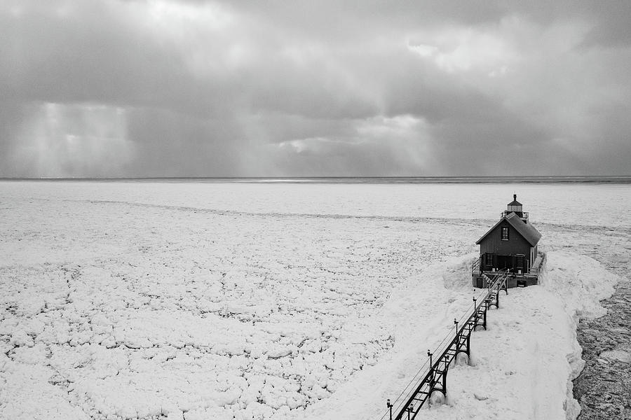 Grand Haven Michigan lighthouse in the winter in black and white #6 Photograph by Eldon McGraw