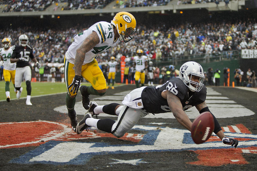 Green Bay Packers v Oakland Raiders #6 Photograph by Brian Bahr