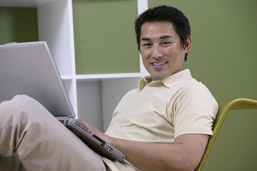 Man with laptop #6 Photograph by Comstock Images